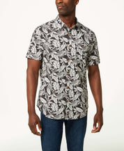 Poplin Floral Print In Forged Iron shirt model wearing short sleeved floral print button down.