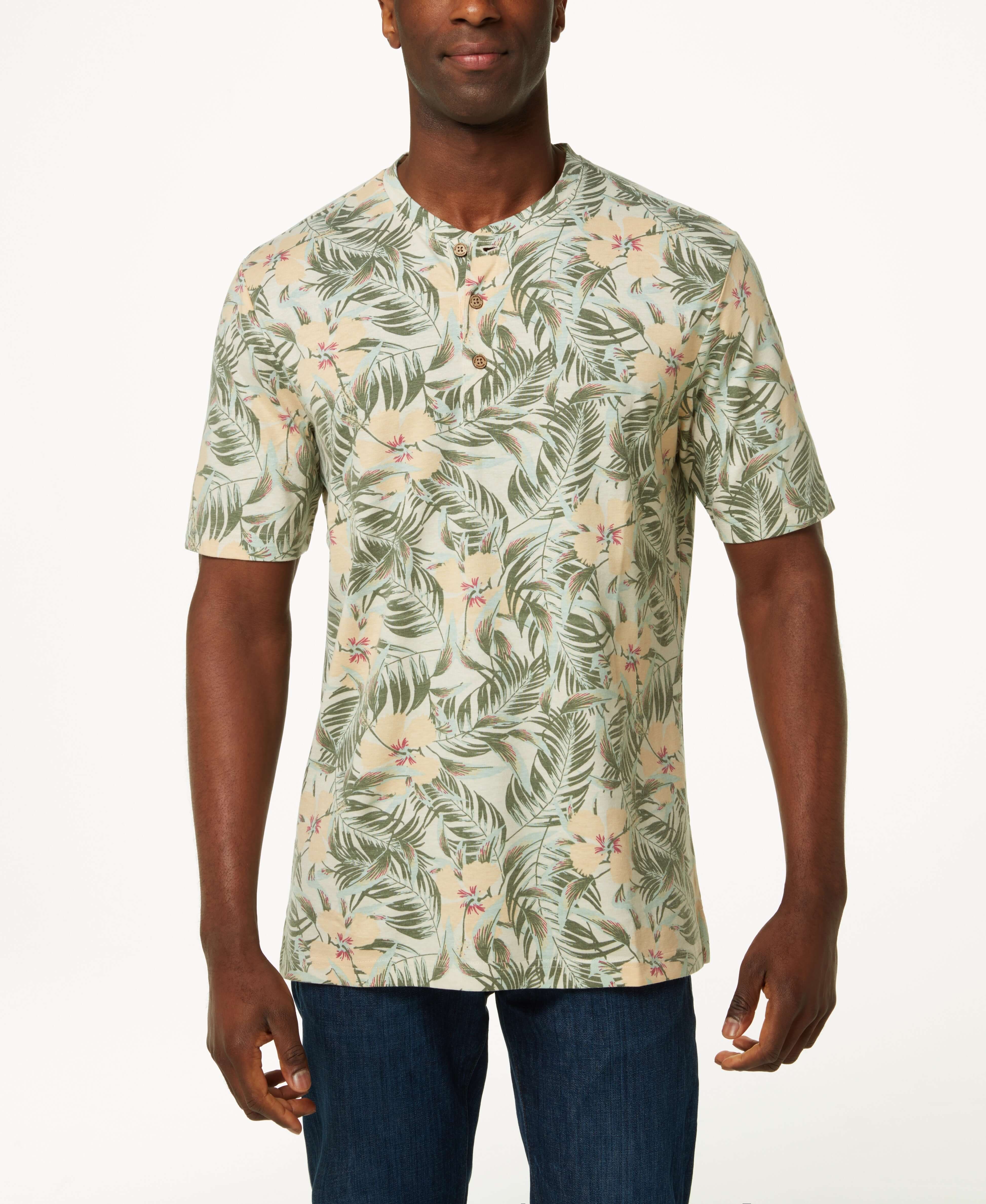 Printed Short Sleeve Henley In Antique White worn by a man with a floral pattern.