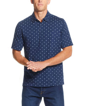 Short Sleeve Allover Print Jersey Polo In Dress Blues worn by a man, featuring compass mini print on a navy background.