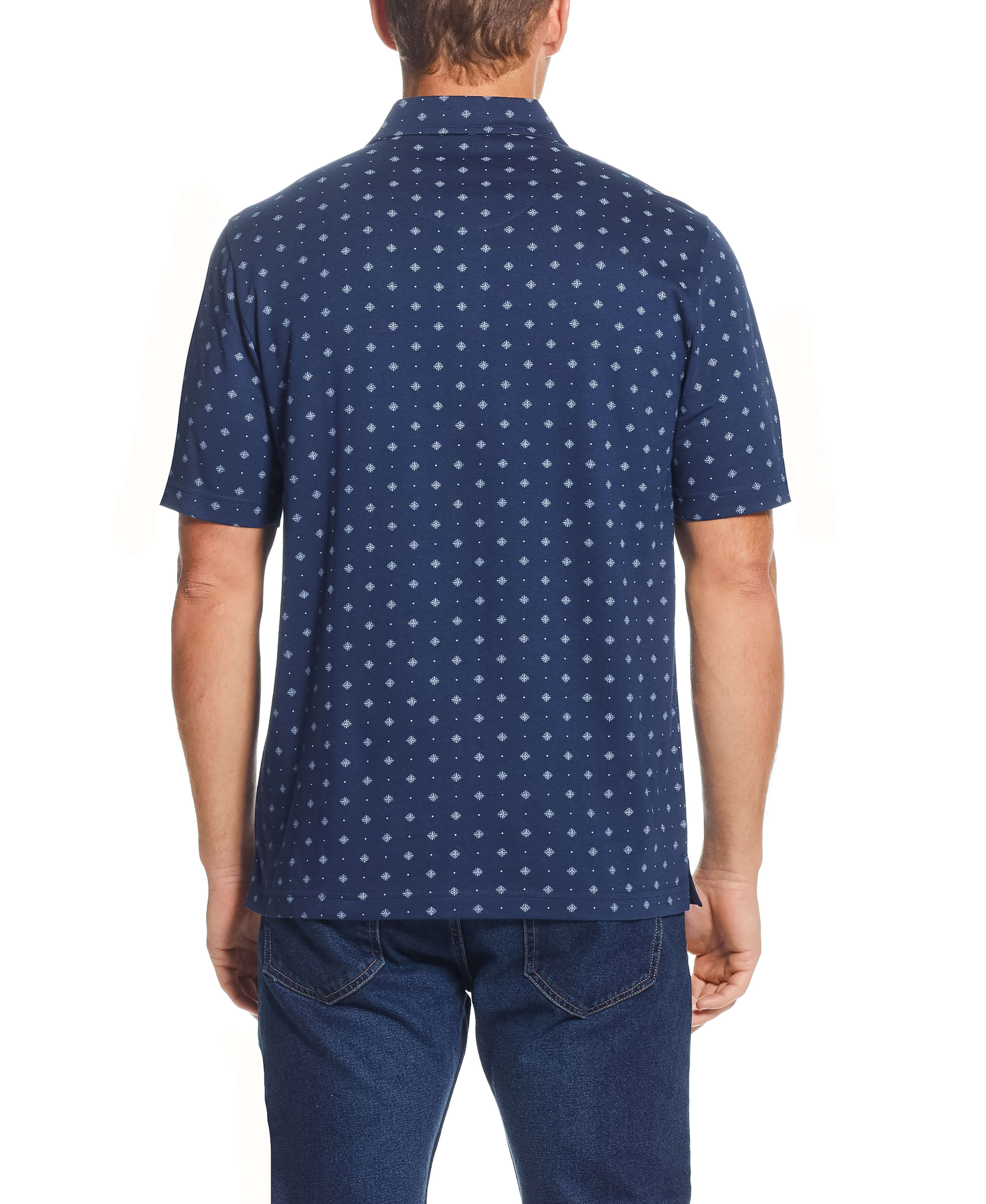 Short Sleeve Allover Print Jersey Polo In Dress Blues, featuring a stylish compass mini print and a comfortable polo collar.