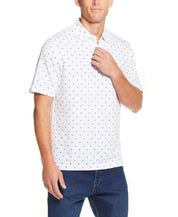 Short Sleeve Allover Print Jersey Polo In White worn by a model, featuring a compass mini print and polo collar.