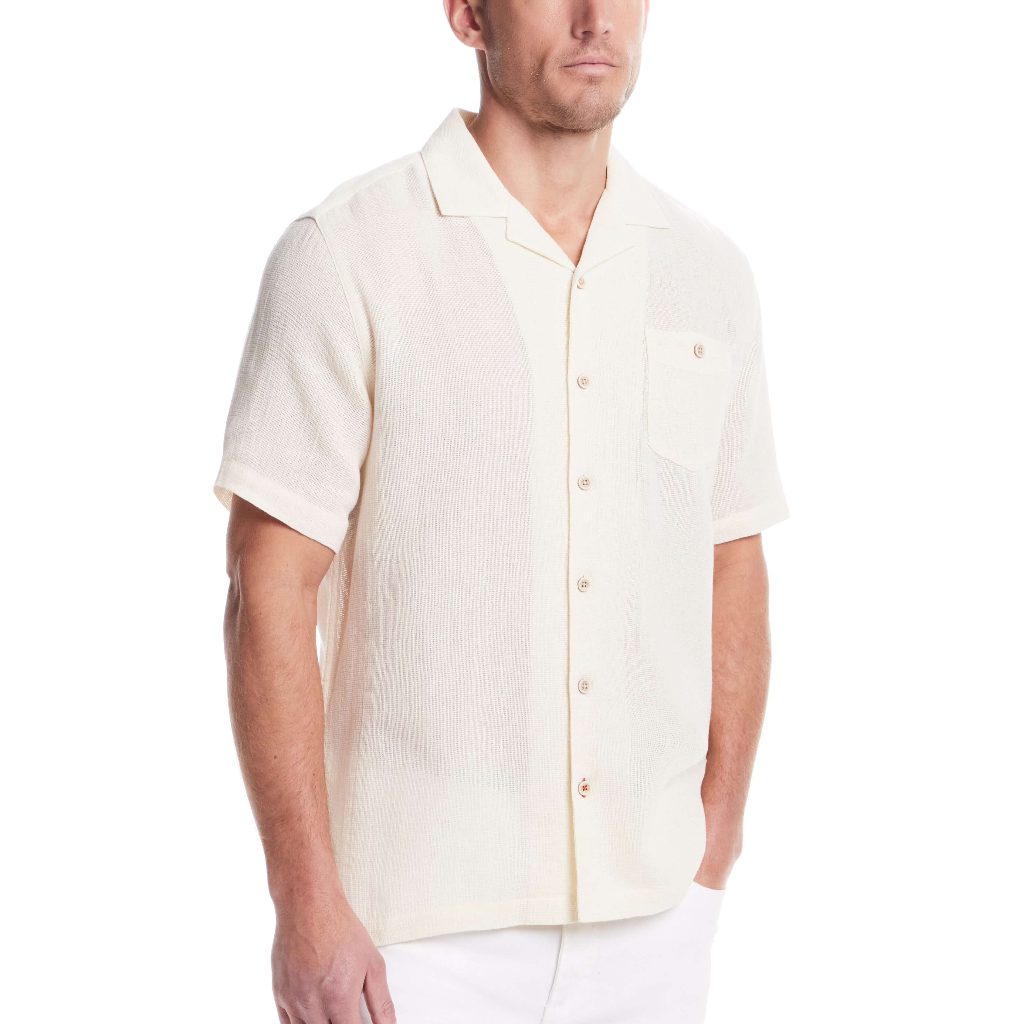 Short sleeve cotton linen Airtex shirt in cream, featuring camp collar and button-down pocket, ideal for vacation style.