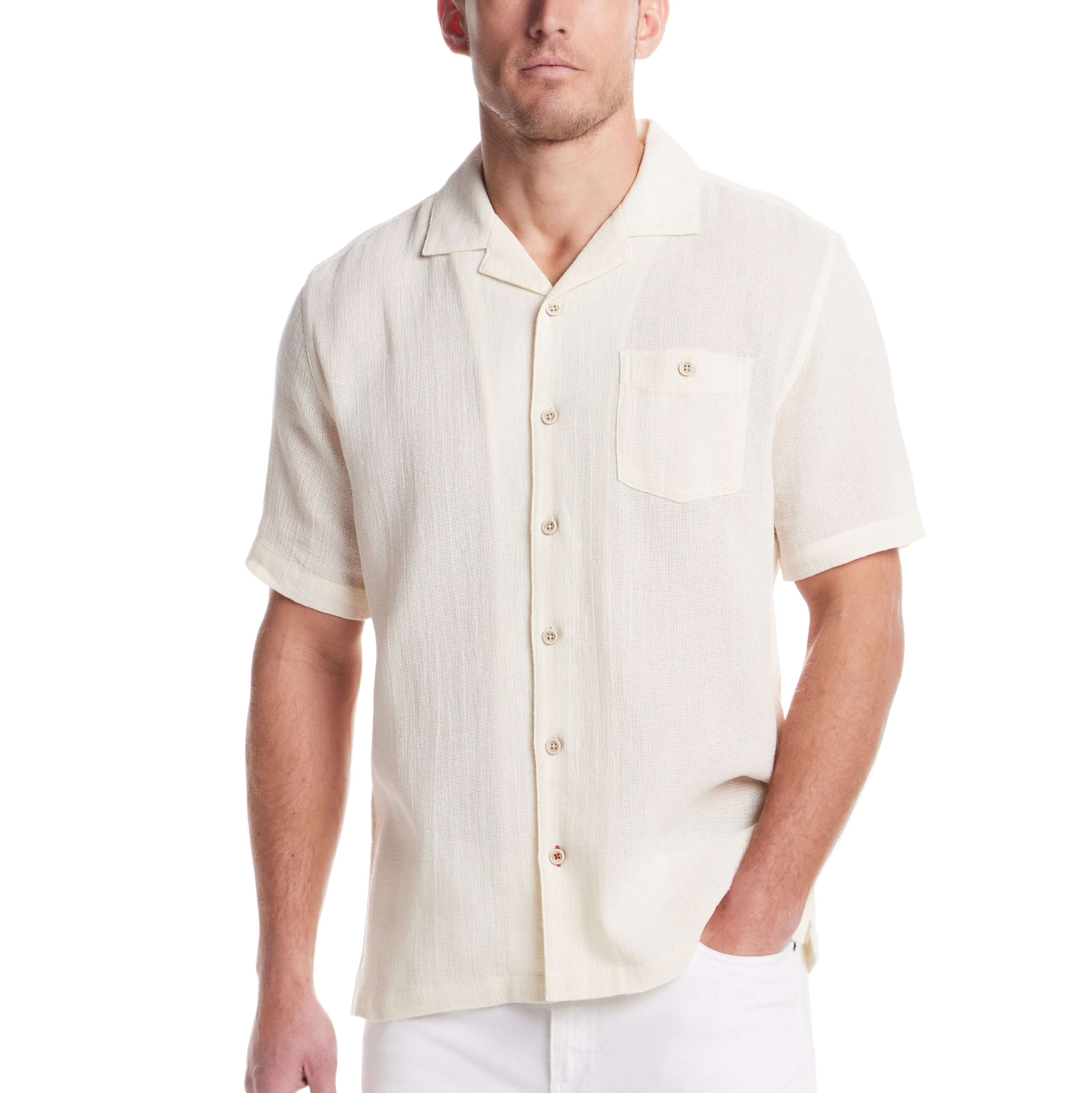 Short sleeve cream cotton linen Airtex shirt with camp collar and button down pocket, perfect for vacation style.