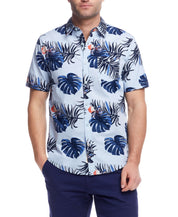 Men's short sleeve tropical shirt featuring a blue palm leaf print, perfect for casual summer outings.