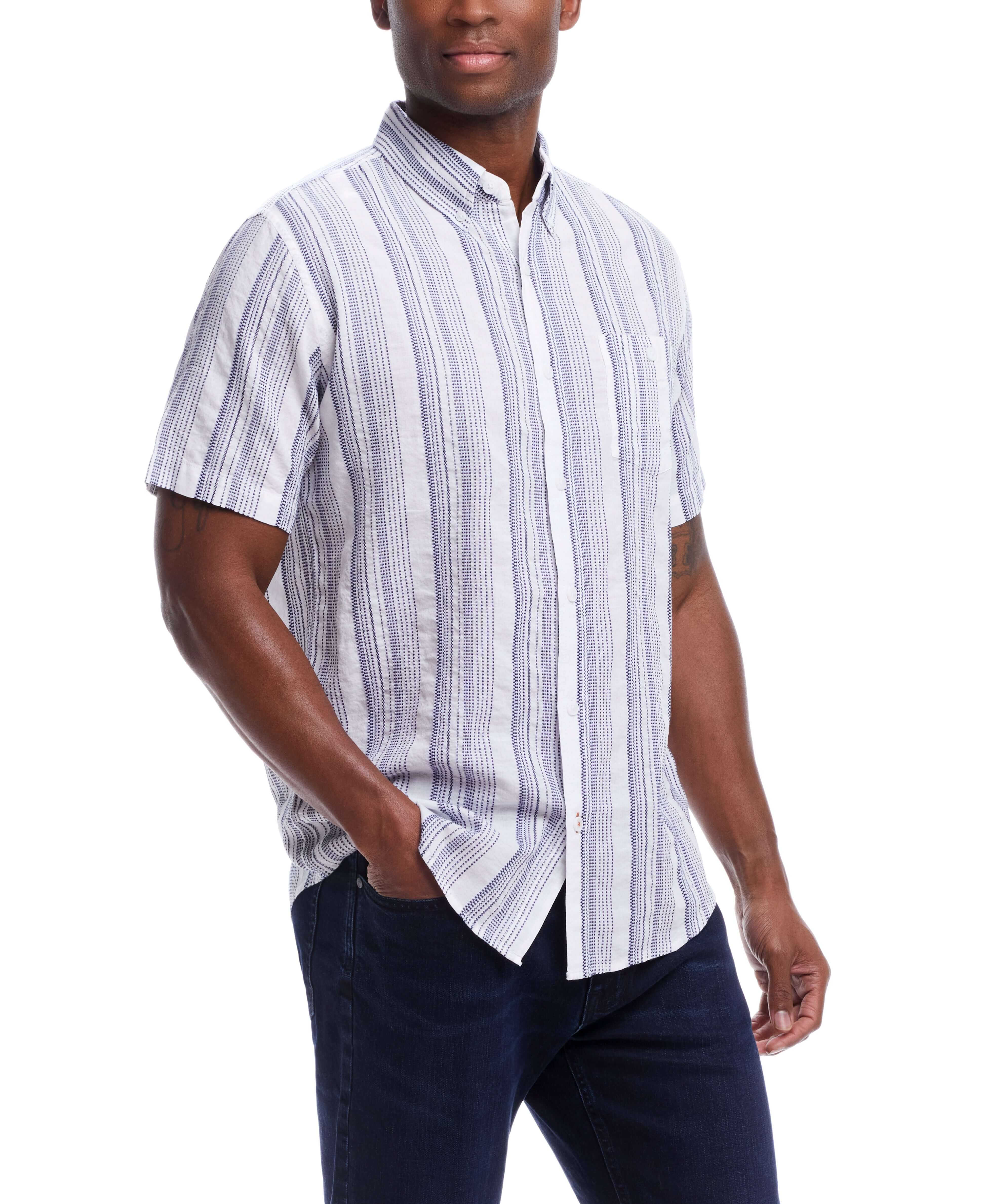 Short Sleeve Cotton Shirt With Ticking Stripe In Cloud worn by a model, featuring a button-down collar and embroidery.