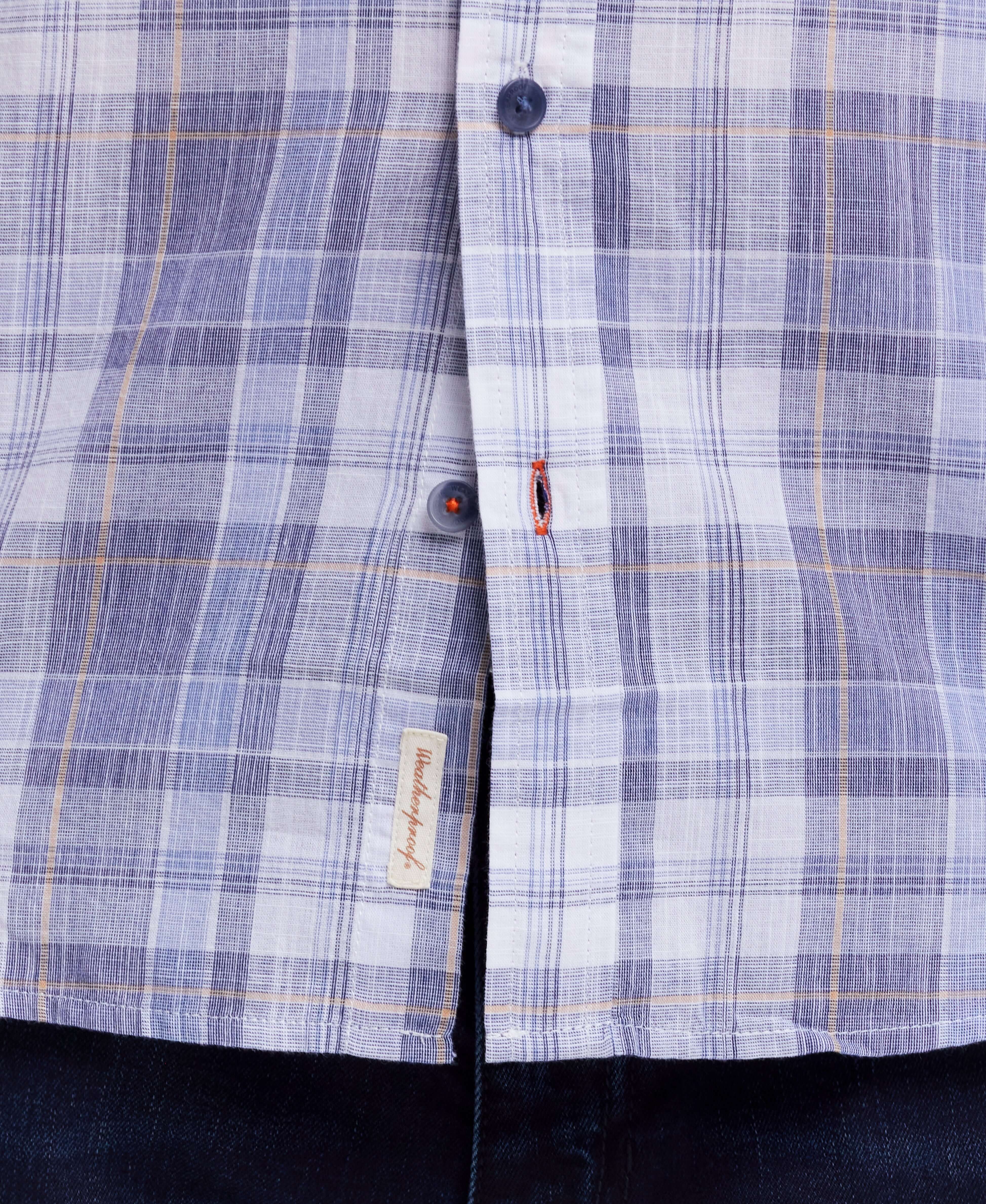 Short Sleeve End-On-End Plaid In Kentucky Blue featuring a button-front detail and relaxed fit.