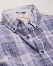 Short Sleeve End-On-End Plaid In Kentucky Blue shirt featuring a relaxed fit, short sleeves, and button details.
