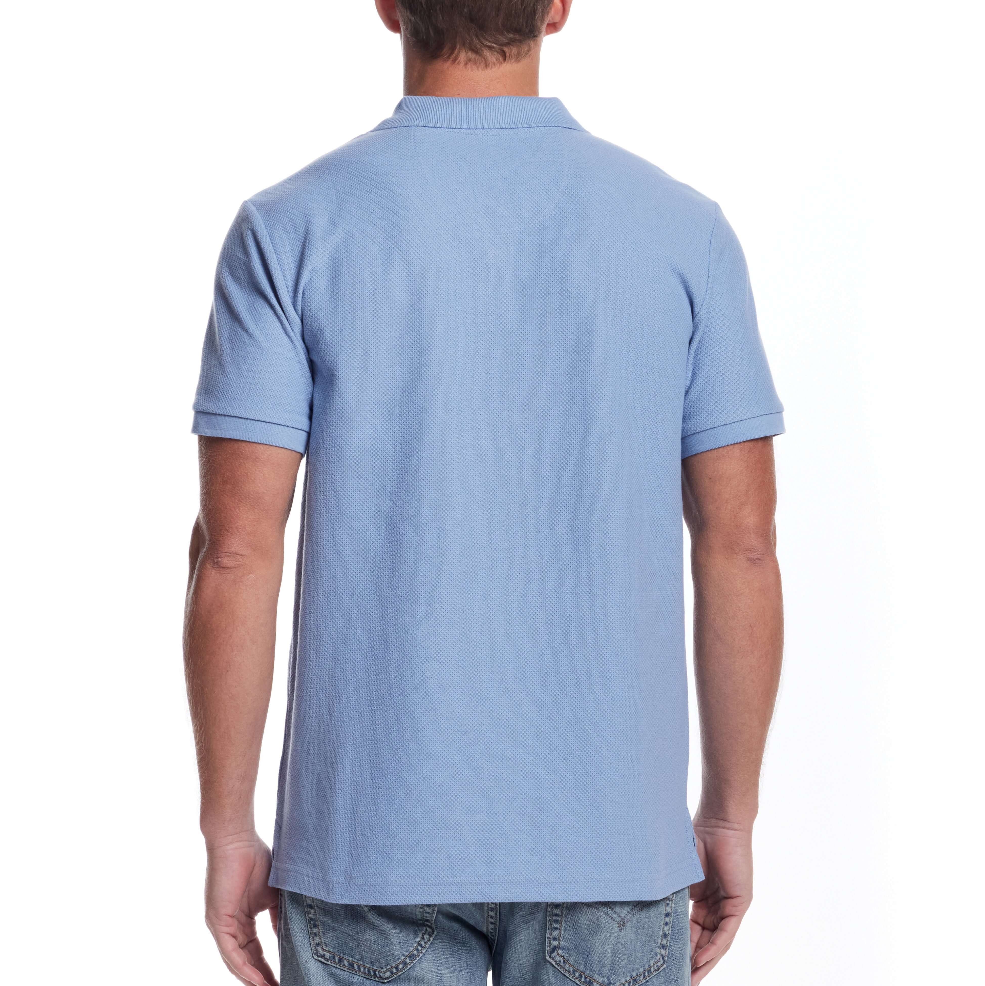 Back view of a man wearing a short sleeve fjord blue honeycomb pique polo shirt, showing ribbed collar and cuffs.