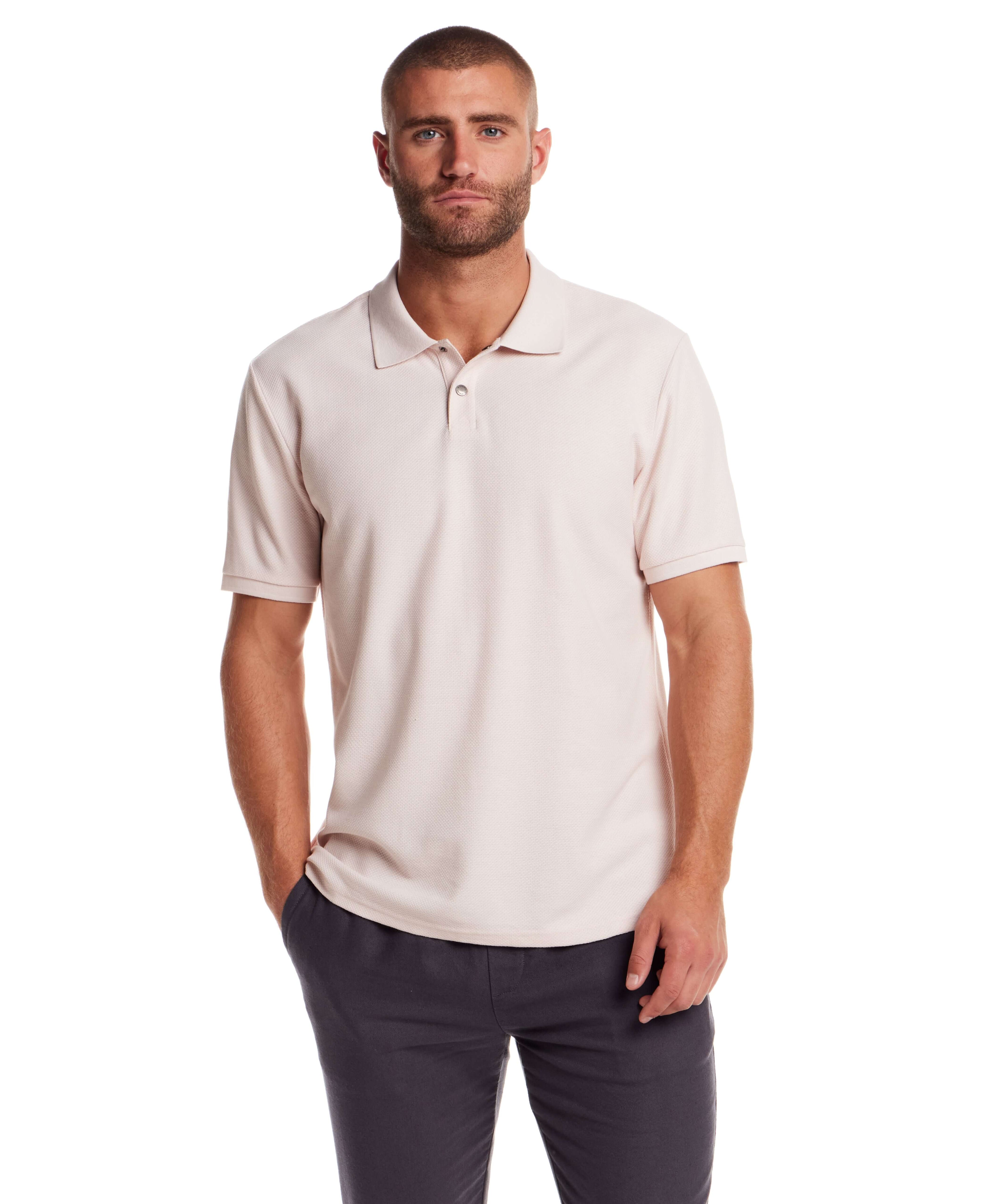 Men's short sleeve honeycomb pique polo shirt in pink, featuring a ribbed collar and classic fit.