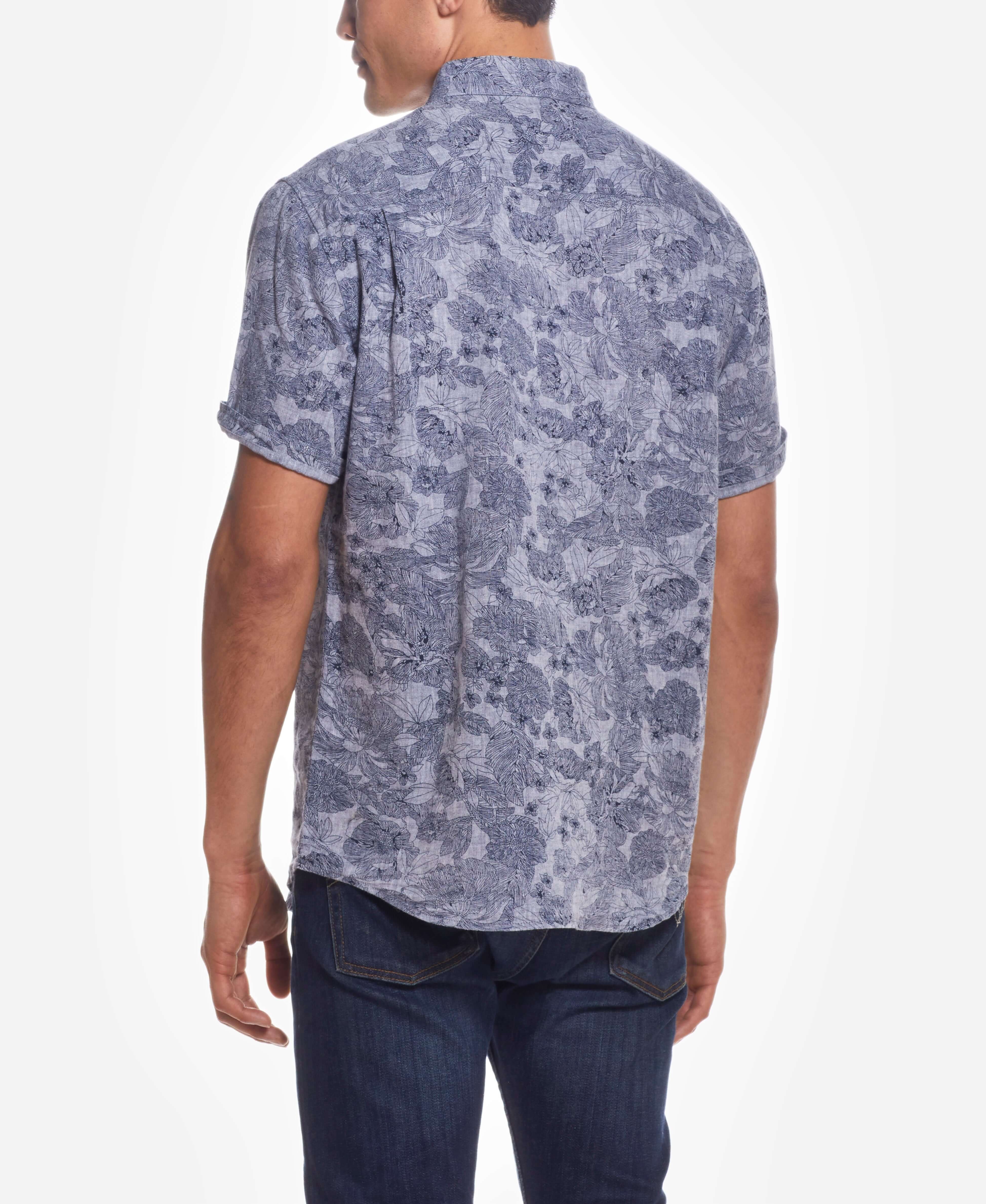 Short Sleeve Linen Cotton Floral Print In Bering Sea shown from the back with cuffed short sleeves.