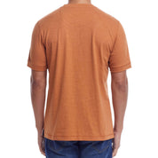 Back view of a man wearing a short sleeve melange henley shirt in adobe color, showcasing its classic fit and rib-knit details.