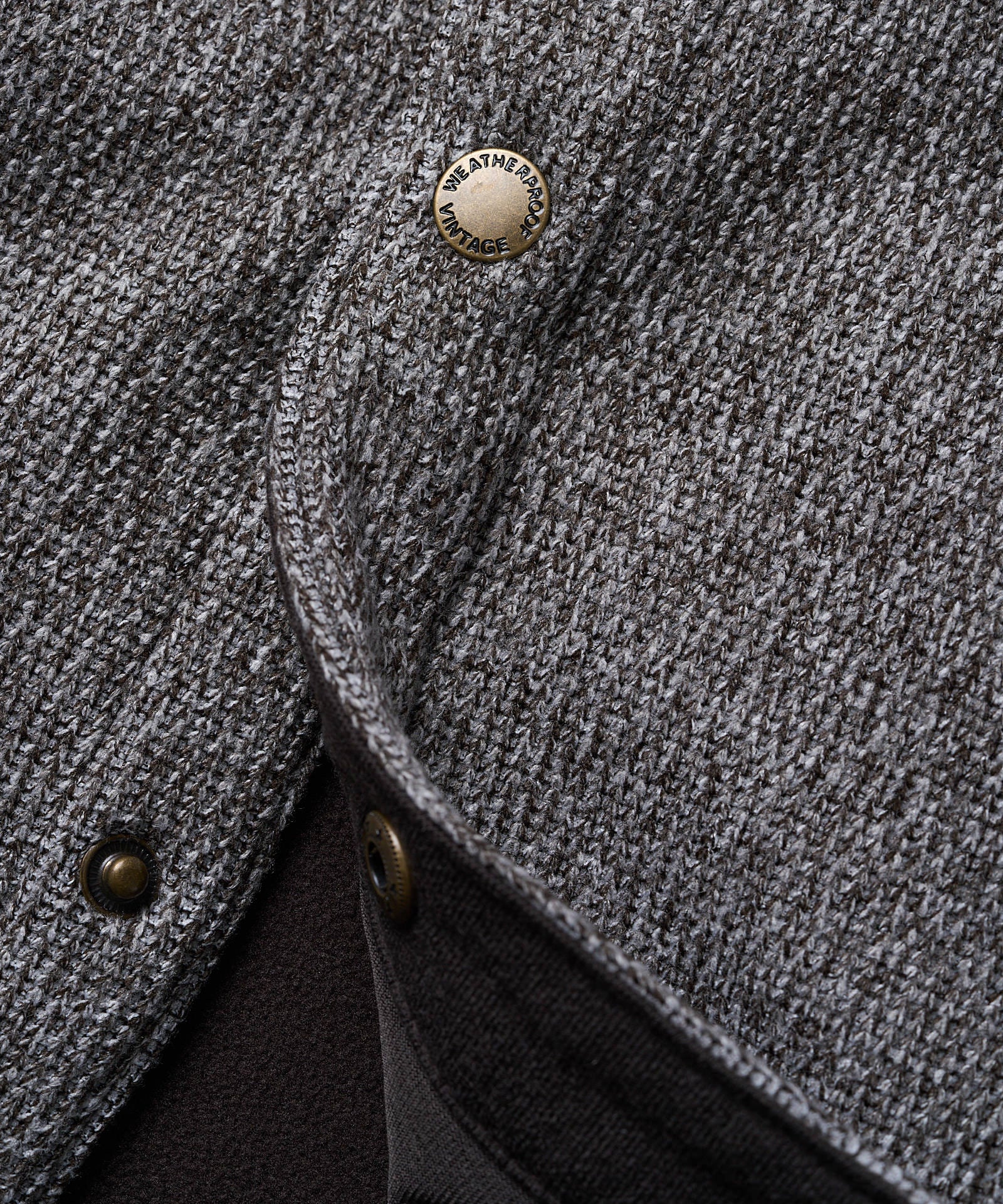Close-up of the Knit Shirt Jacket in Chocolate Torte showcasing textured fabric and snap-front closure.