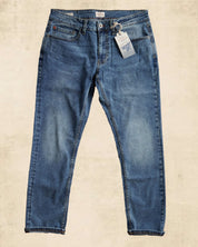 Slim fit denim jeans in cracked ice, featuring all-way stretch and a comfortable lower waist design.