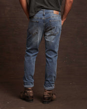 Men's slim fit denim jeans in Cracked Ice, showcasing a straight cut and comfortable All-Way stretch for optimal fit.