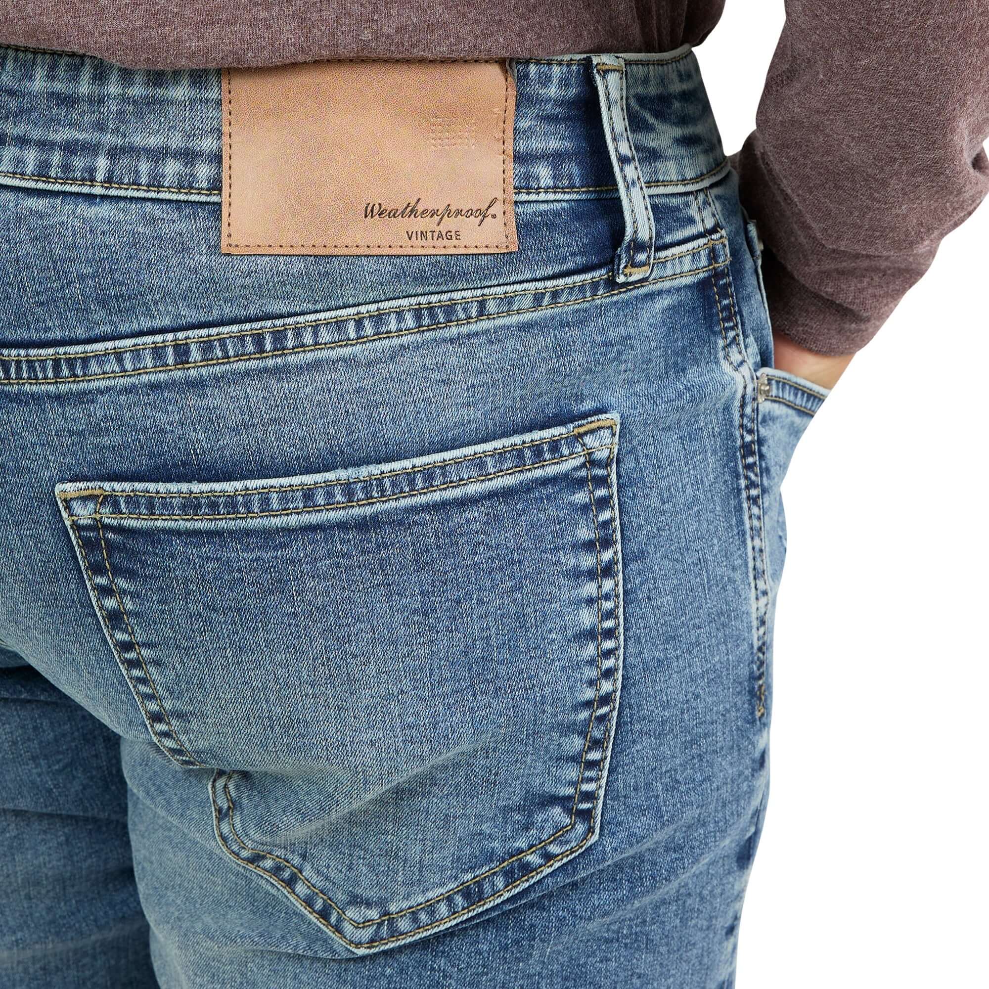 Close-up of slim fit denim jeans in Cracked Ice, featuring a premium cotton blend and comfortable stretch fit.