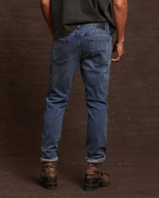 Back view of slim fit denim jeans in Niagara color, tailored for comfort and style with a modern straight fit.