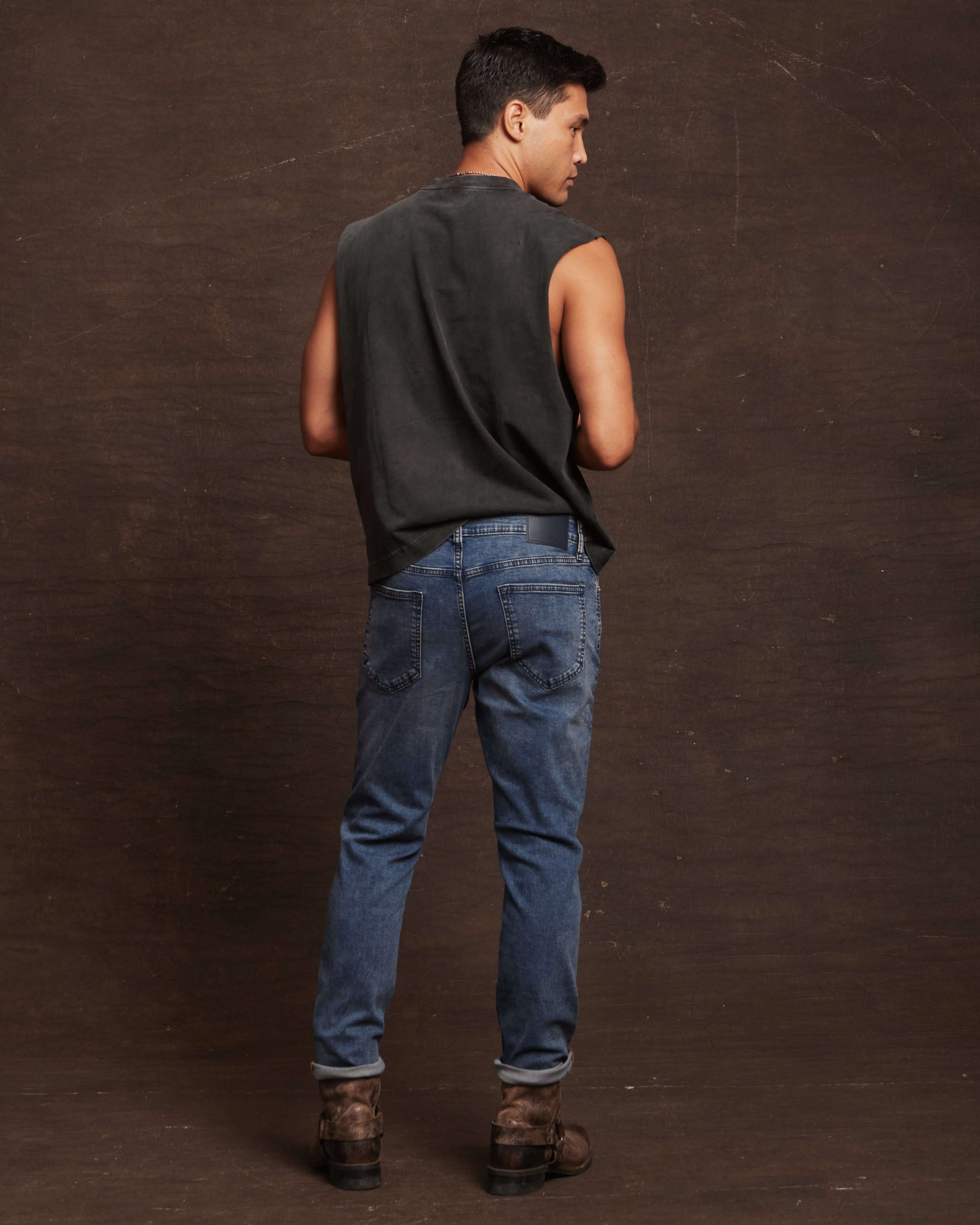 Slim fit denim jeans in Niagara, featuring a comfortable stretch fit and a stylish design for men.