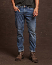 Slim fit denim jeans in Rocker Blue, featuring All-Way stretch and a comfortable, stylish look for men.