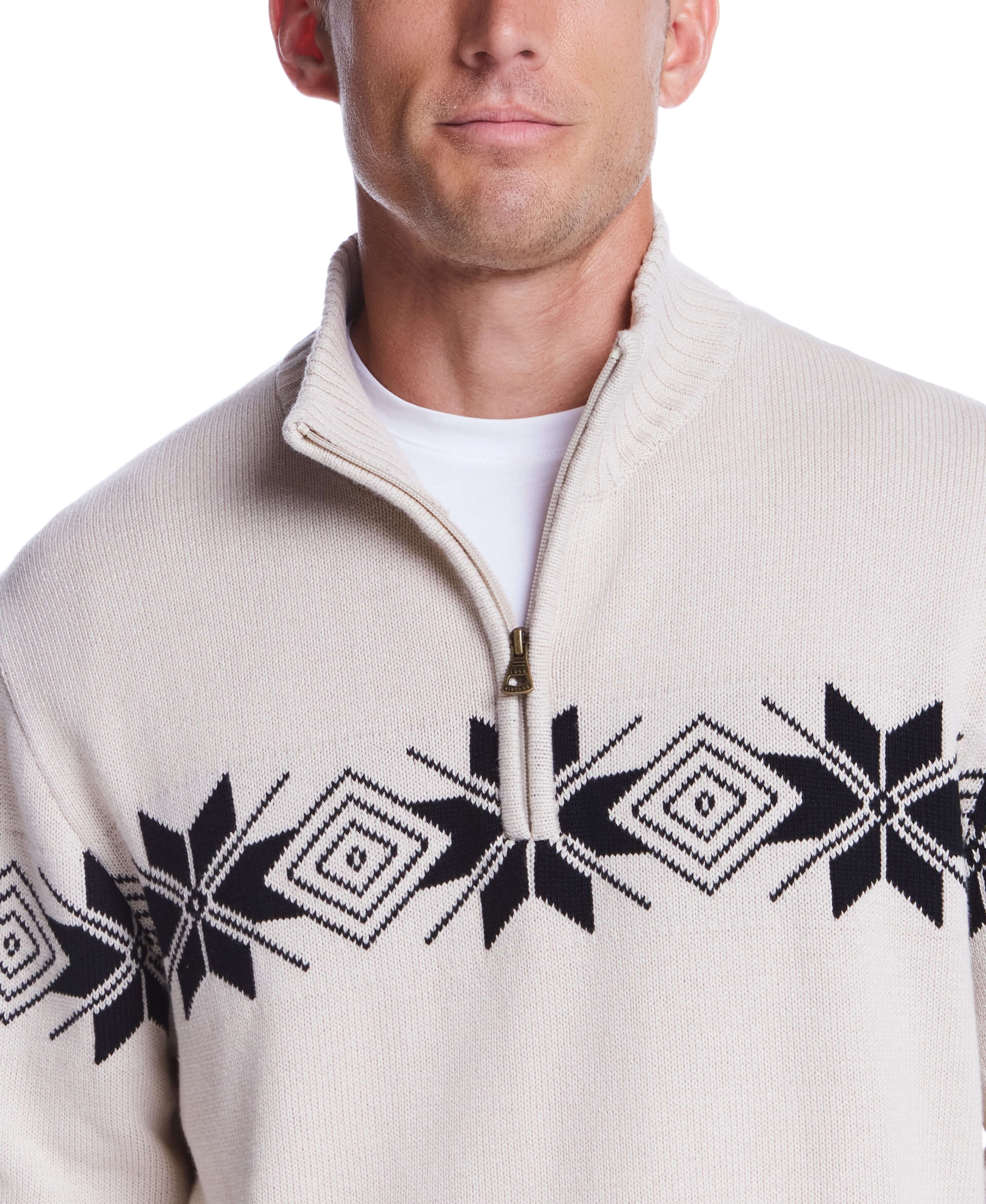 Model wearing a beige Snowflake Quarter Zip Sweater with black geometric patterns, suitable for holidays and casual occasions.