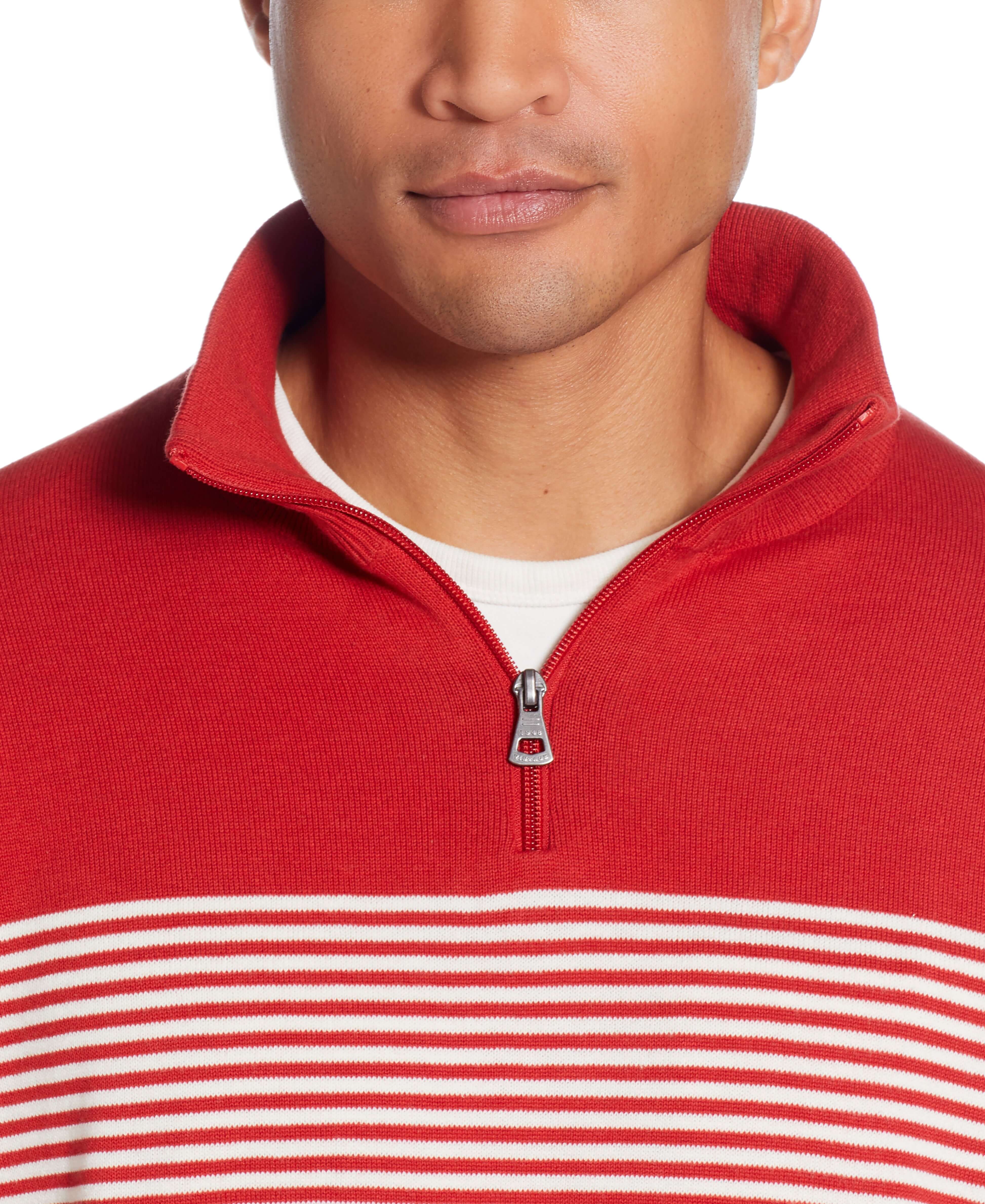 Striped 1/4 Zip Sweater In Tangerine model wearing close-up with quarter zip and mock neck style.