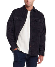Superfine Corduroy Overshirt Moonless Night worn by a man, featuring button-flap chest pockets and a classic fit.
