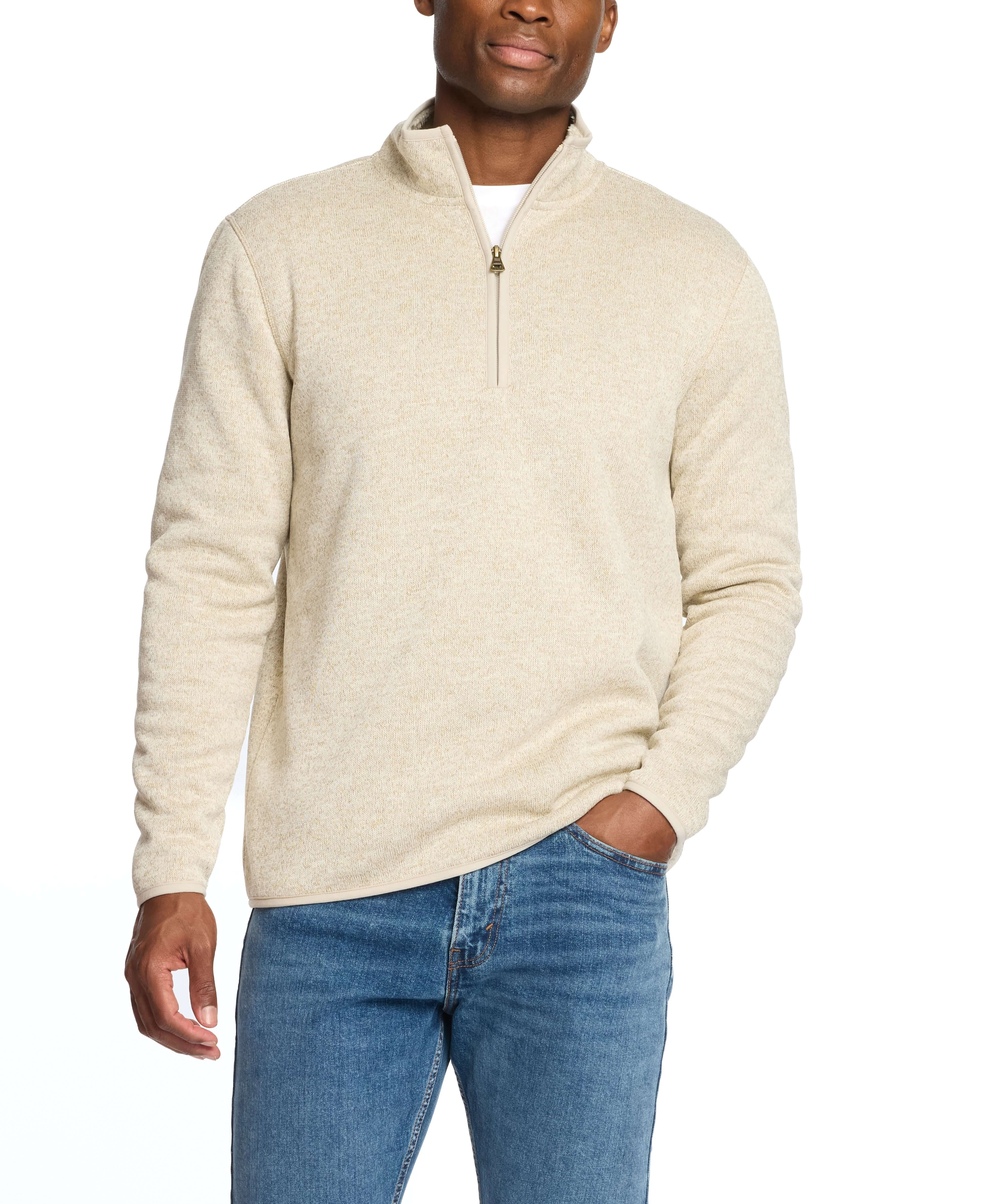 Man wearing a stone-colored sweaterfleece pullover with sherpa trim, perfect for layering and warmth.