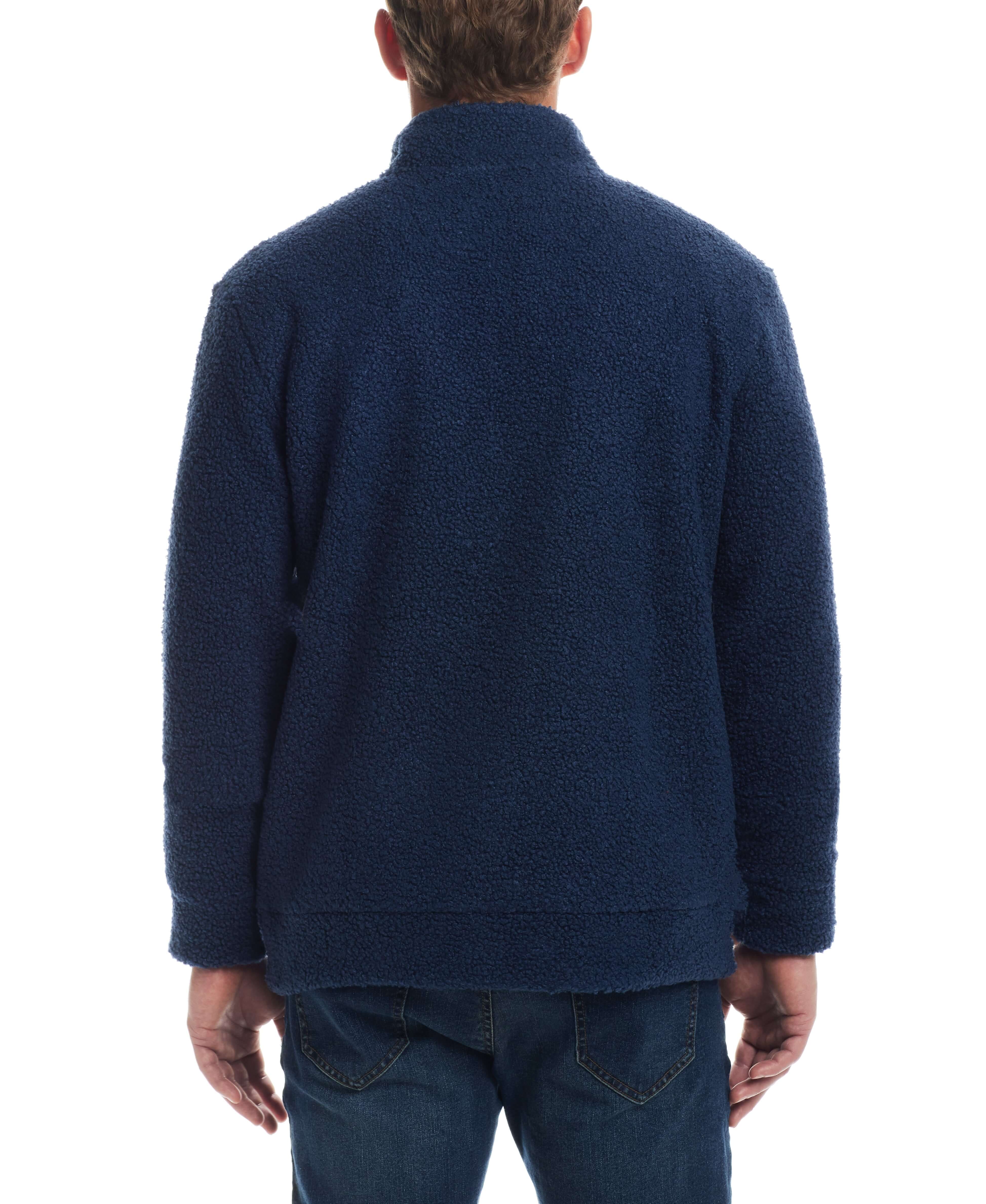 Back view of a man wearing a Teddy Sherpa pullover in Pageant Blue, showcasing its plush fleece fabric.
