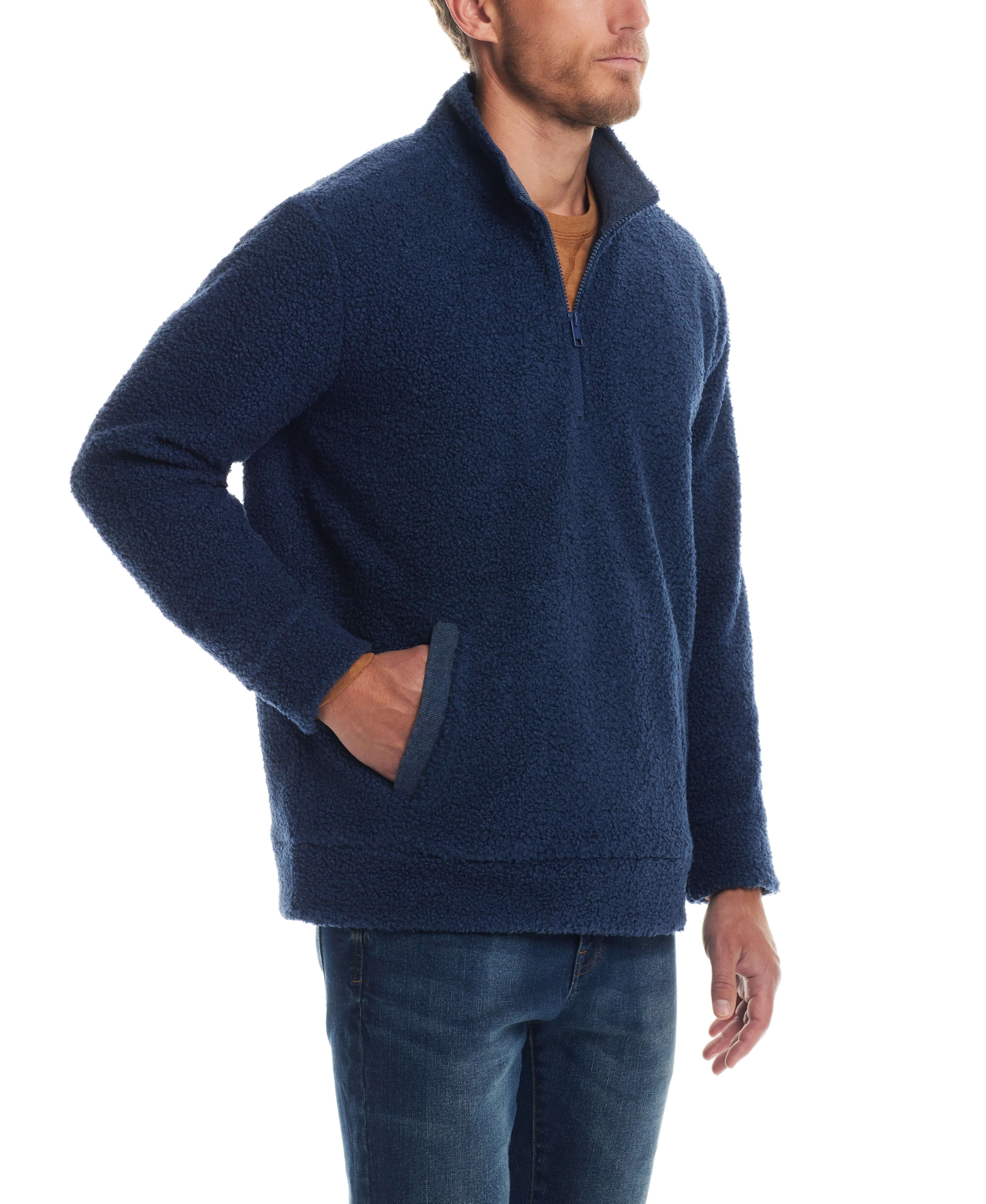 Teddy Sherpa pullover in Pageant Blue, featuring cozy fleece, quarter-zip design, and hand warmer pockets, modeled by man.