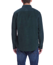 Back view of a man wearing a Thin Wale Solid Cord Shirt in Scarab, showcasing the soft, stretchy corduroy fabric.