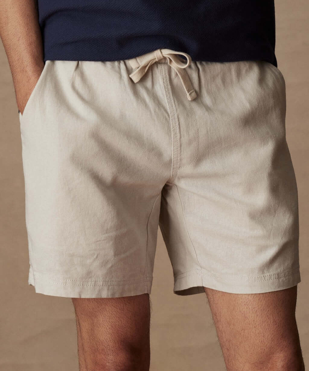 7" linen shorts in Vapor Grey with adjustable drawstring and side pockets, perfect for a relaxed summer look.