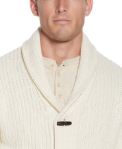 CARDI W TOGGLES LINED in ECRU worn by a model, showcasing shawl collar, wood toggle buttons and rib-knit design.