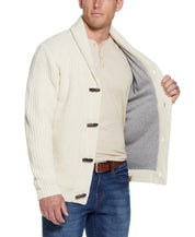 CARDI W TOGGLES LINED in ECRU worn by a man, showcasing the shawl collar and wood toggle buttons, revealing a jersey lining.