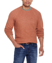 Waffle Crewneck Sweater In Allspice worn by a man, showcasing its warm and cozy waffled texture.