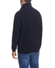 Back view of a man wearing a Cable Knit Quarter Zip Sweater In Black, highlighting the mock neck and cozy design.