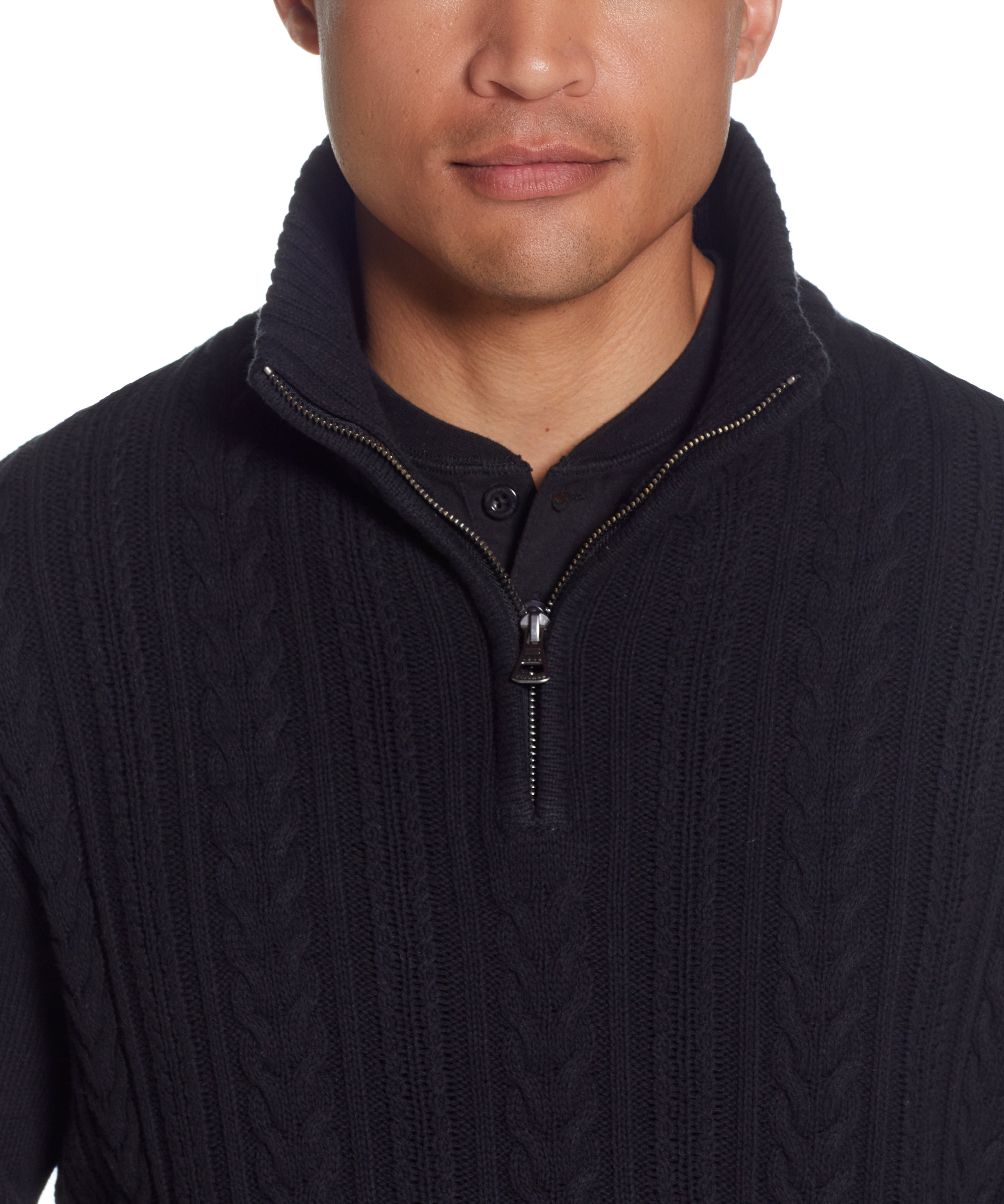 Close-up of a male model wearing a Cable Knit Quarter Zip Sweater In Black with a mock neck and quarter zip detail.