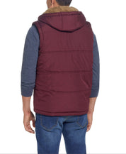 Sherpa Lined Hooded Puffer Vest In Port back view showing drawcord hood and sherpa lining for warmth.