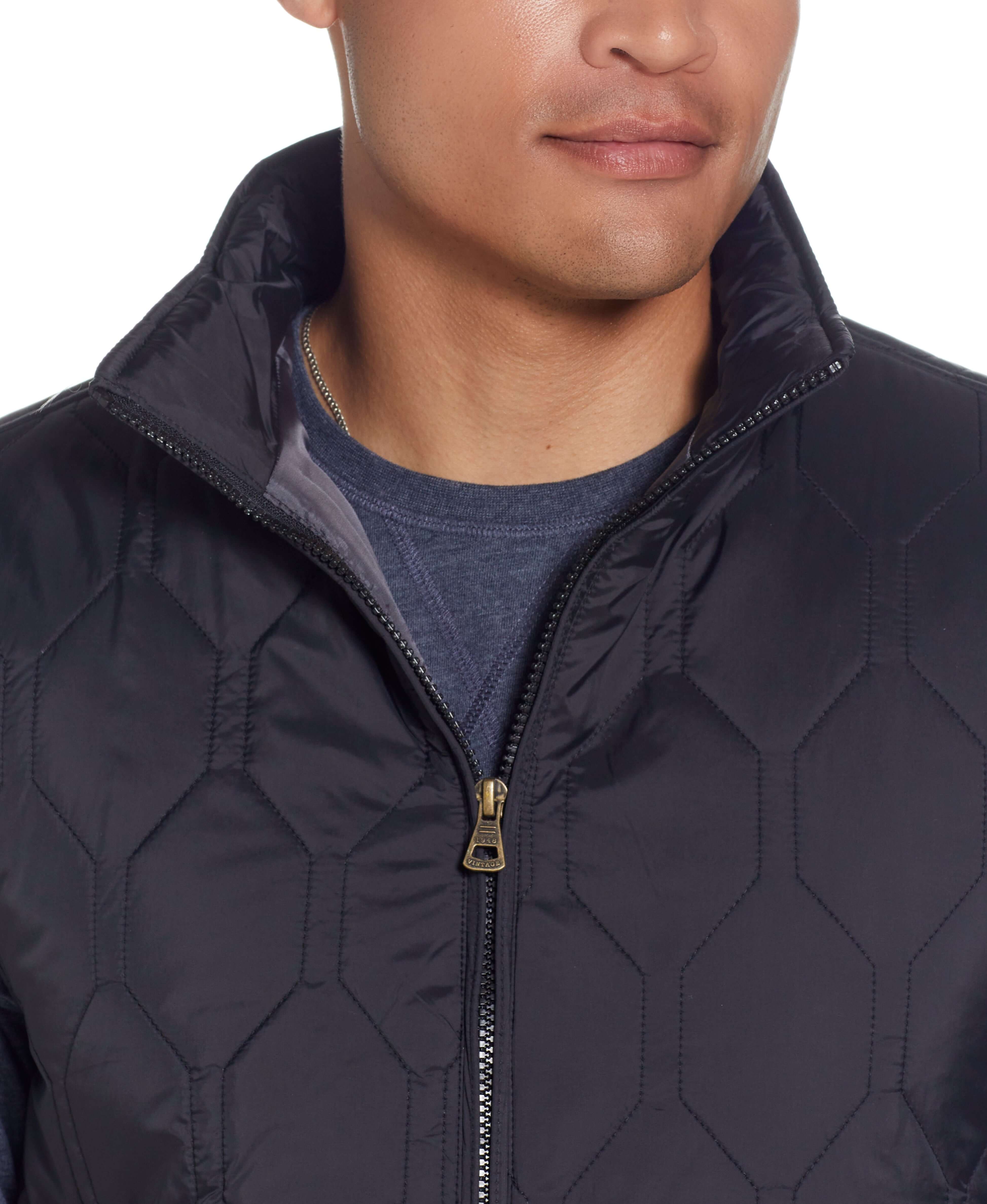 HEXAGON QUILTED LIGHTWEIGHT VEST in BLACK, featuring a front zipper and mock-neck design.