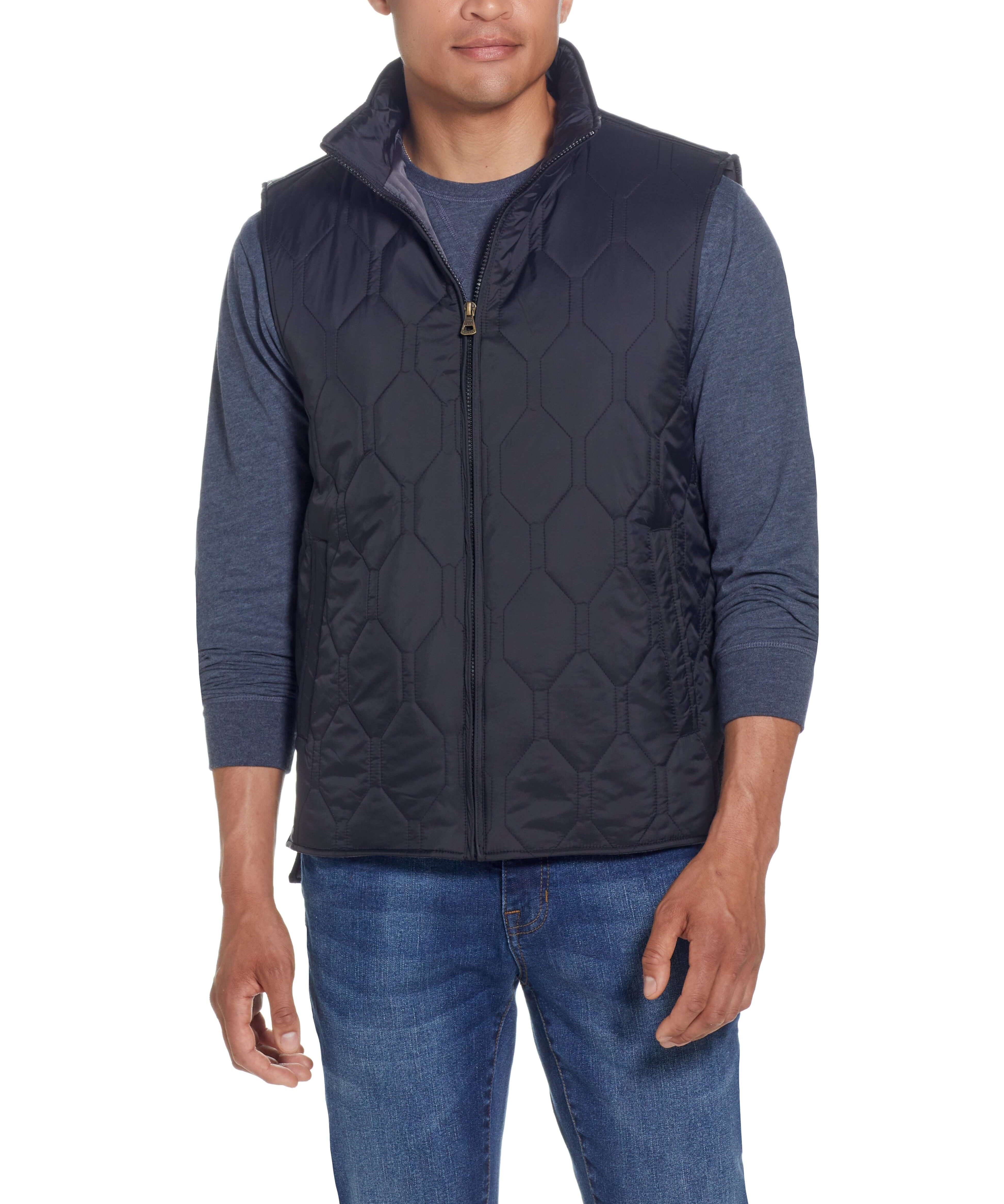 HEXAGON QUILTED LIGHTWEIGHT VEST in BLACK worn by a model, featuring a front zipper closure and mock-neck design.
