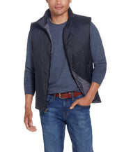 HEXAGON QUILTED LIGHTWEIGHT VEST in BLACK worn by a model, showcasing the mock-neck and front zipper.