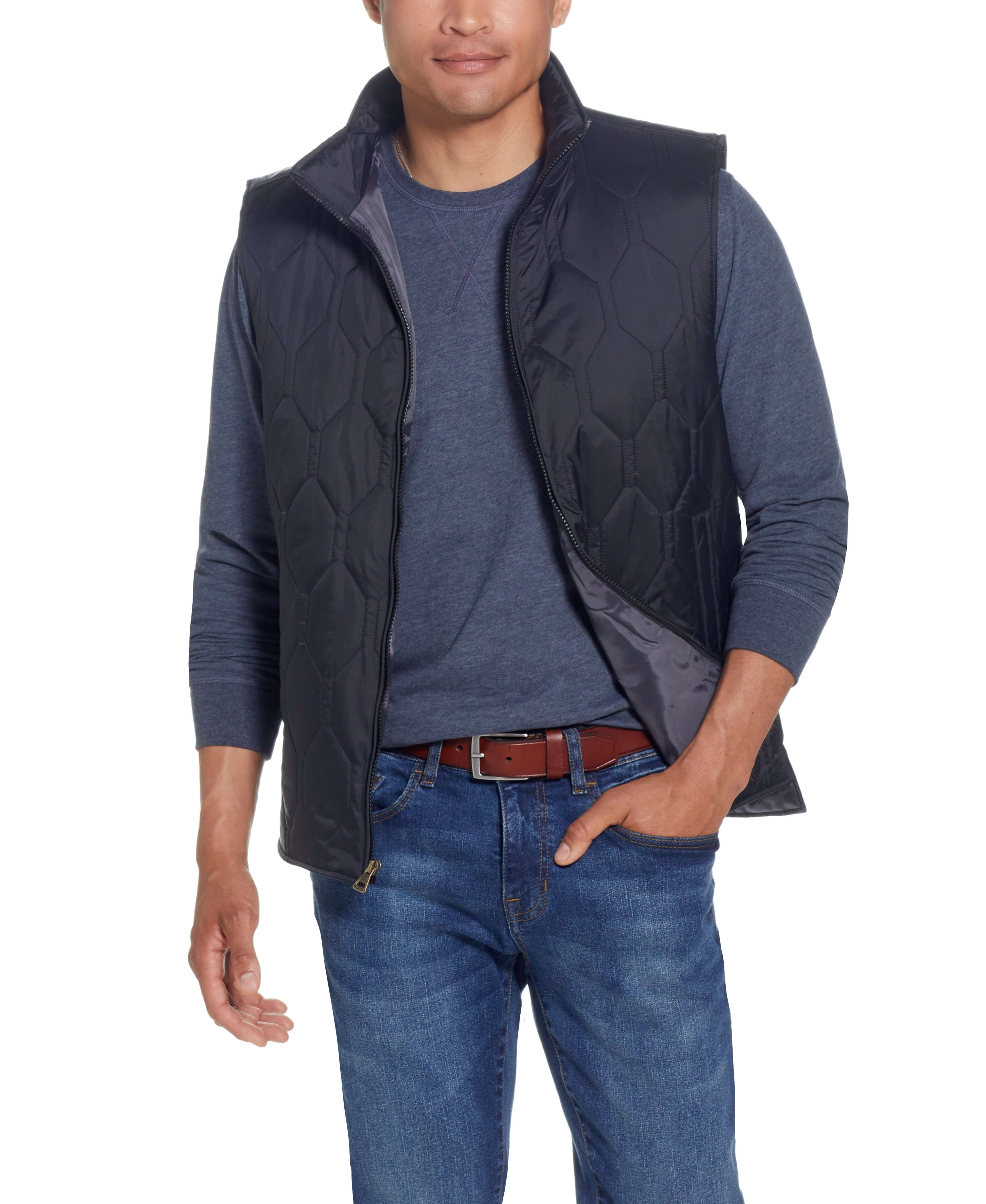 HEXAGON QUILTED LIGHTWEIGHT VEST in BLACK worn by a model, showcasing the mock-neck and front zipper.