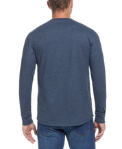Back view of a man wearing the L/S BRUSHED JERSEY CREW in BLUE MIRAGE HTR, showcasing the relaxed fit and long sleeves.