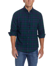 Holiday Antique Flannel Shirt In Deep Sea on a model, featuring a relaxed fit and button front closure.