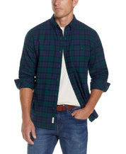 Holiday Antique Flannel Shirt In Deep Sea displayed on a model, showcasing its button down style and relaxed fit.