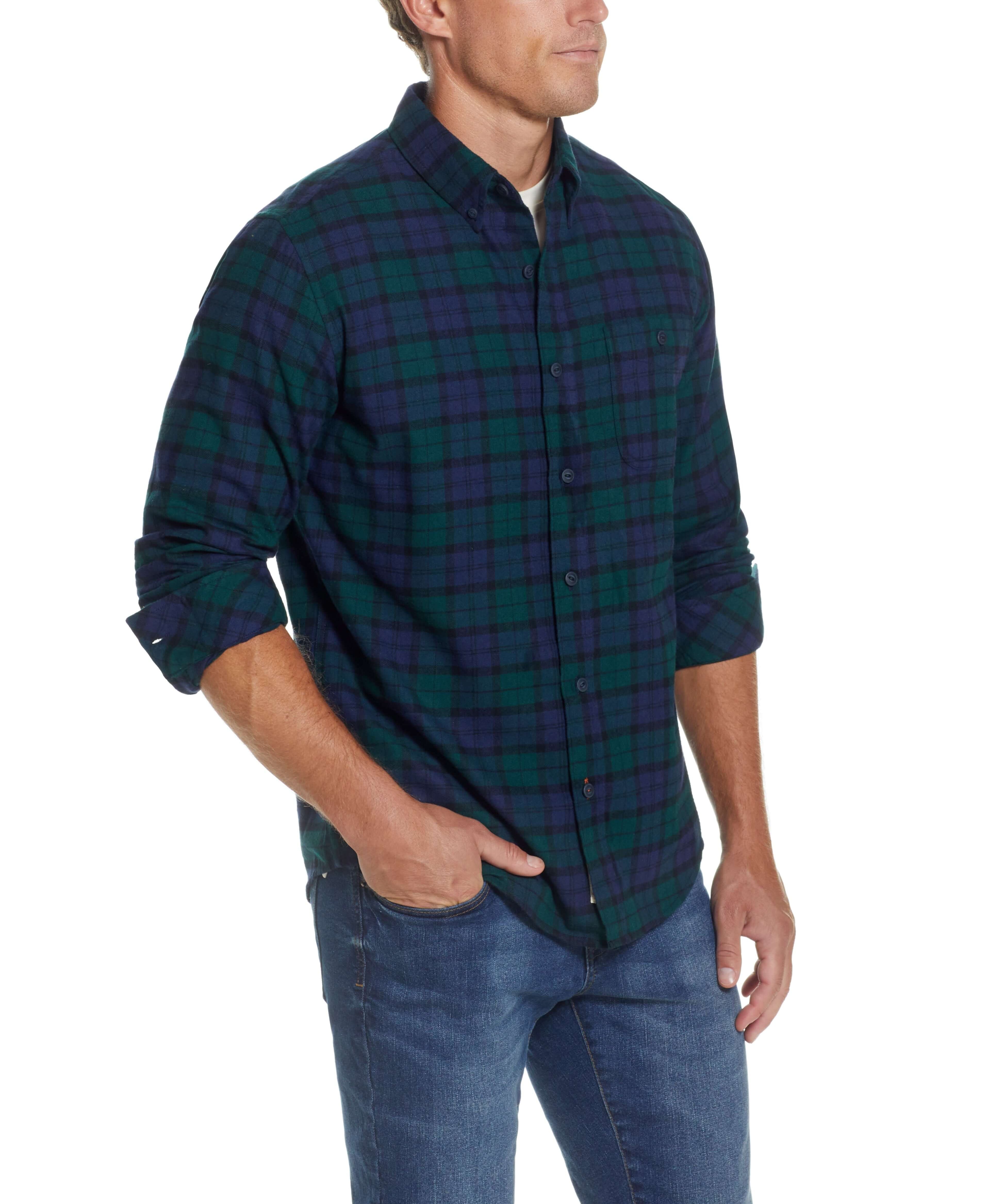 Model showcasing the Holiday Antique Flannel Shirt In Deep Sea, featuring a relaxed fit, button front, and soft brushed fabric.