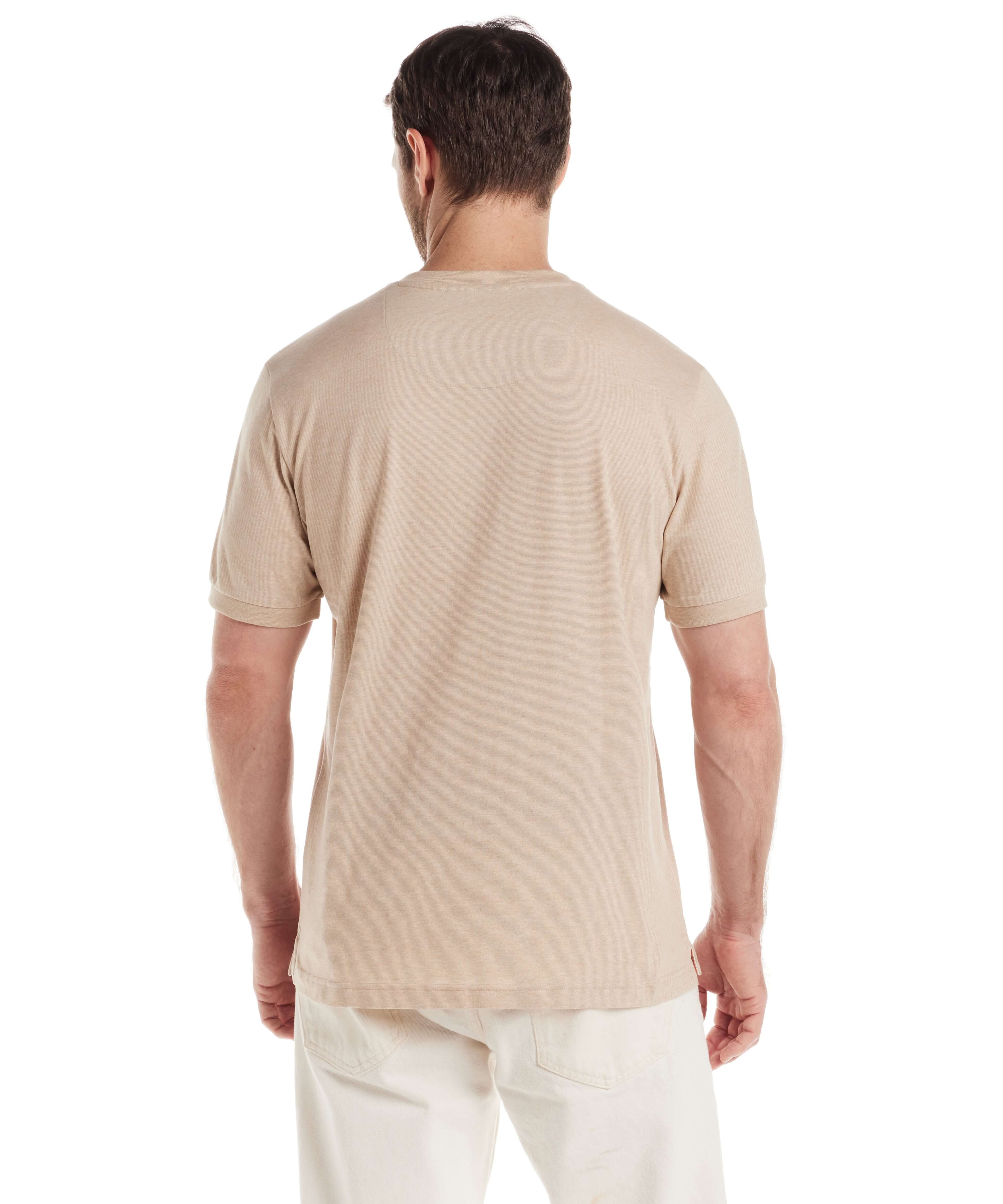 Back view of a man wearing a short sleeve microstripe henley in natural color, showcasing its classic fit and soft fabric.
