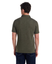 Back view of a man wearing a short sleeve stretch waffle polo in Kambaba Olive, showcasing its classic fit and clean design.