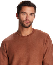 Model wearing a Twill Stonewash Sweater in Gingerbread, showcasing its soft, textured fabric and classic roll-neck design.