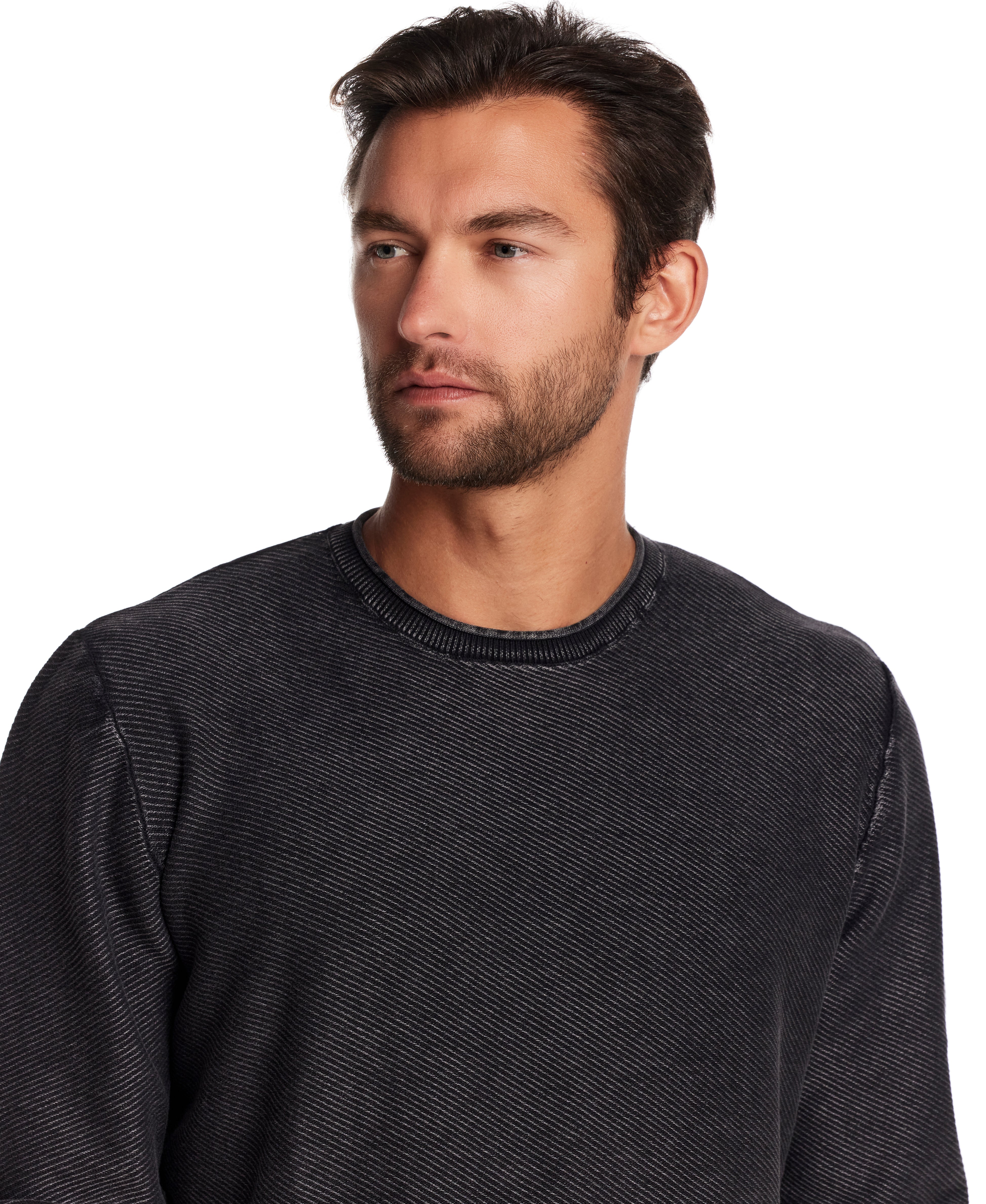 Model wearing a Twill Stonewash Sweater in Meteorite, showcasing its classic roll-neck design and textured knit.