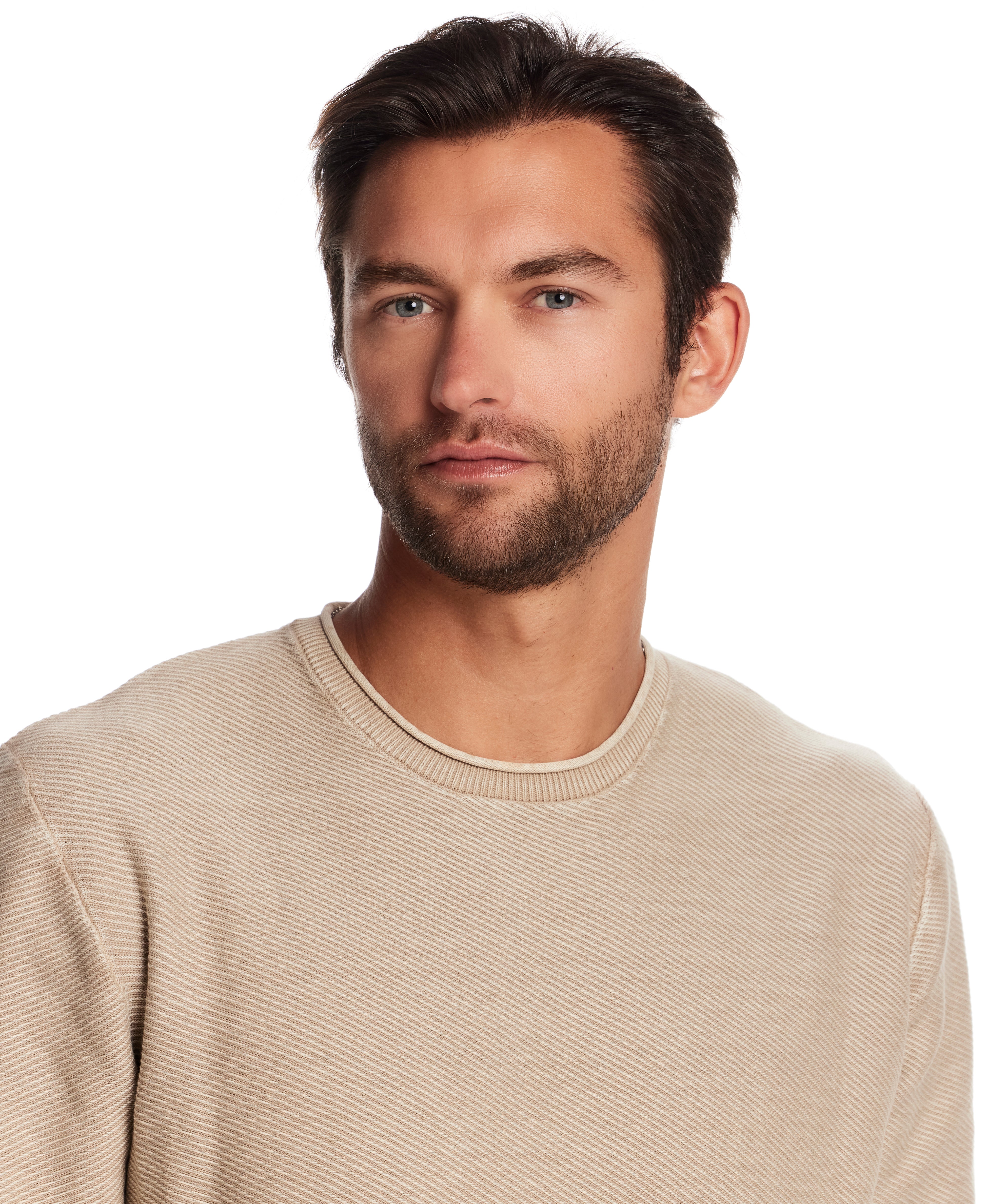 Model wearing a Twill Stonewash Sweater in Vintage Khaki, showcasing its soft knit and classic roll-neck design.