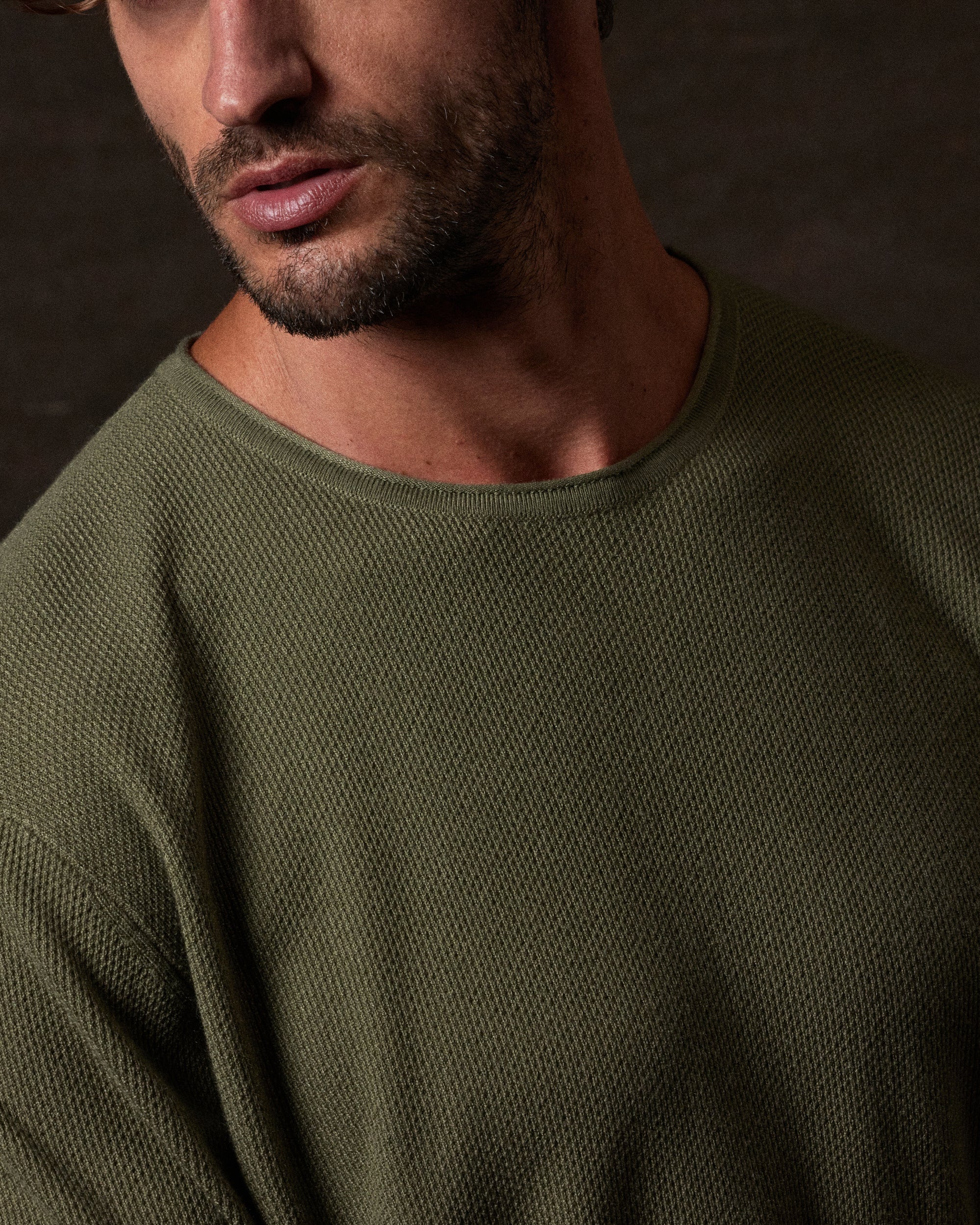 Textured Roll Neck Sweater in Tea Leaf featuring a close-up of the textured fabric and modern silhouette.